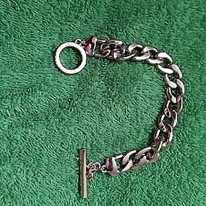 A lady's chain link bracelet.